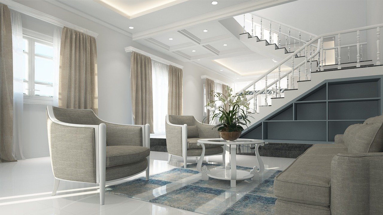 salon moderne lumineux avec escalier et canapé